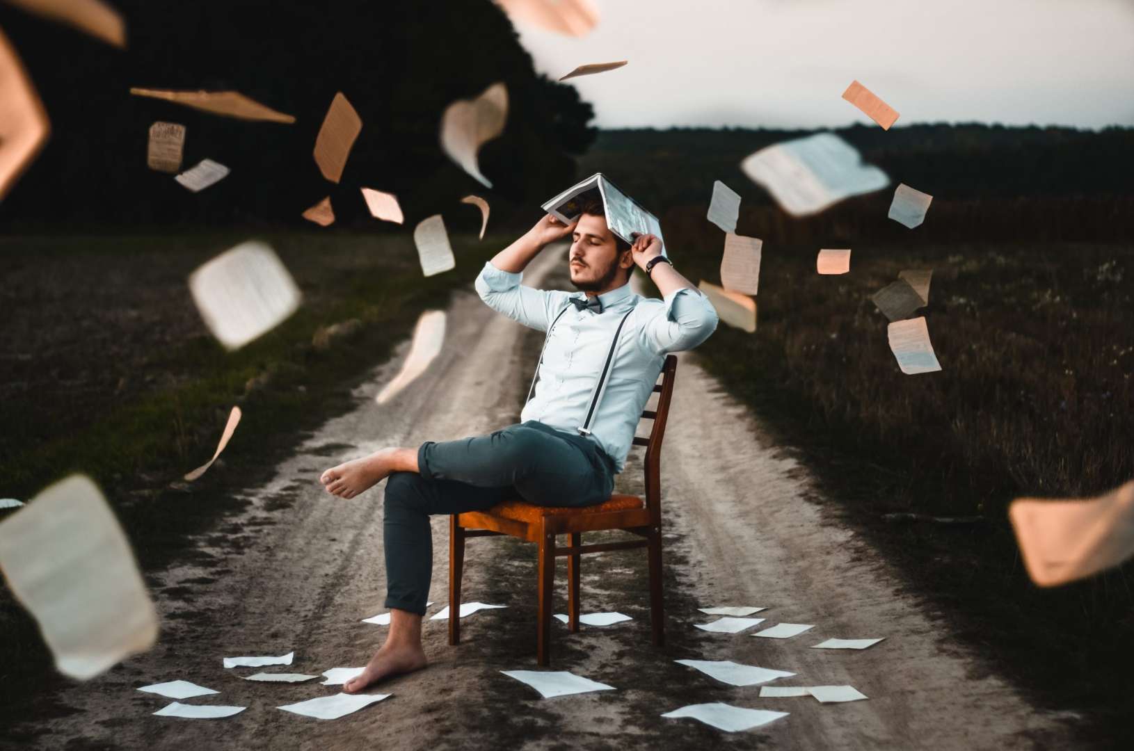 Man Surrounded By Receipts