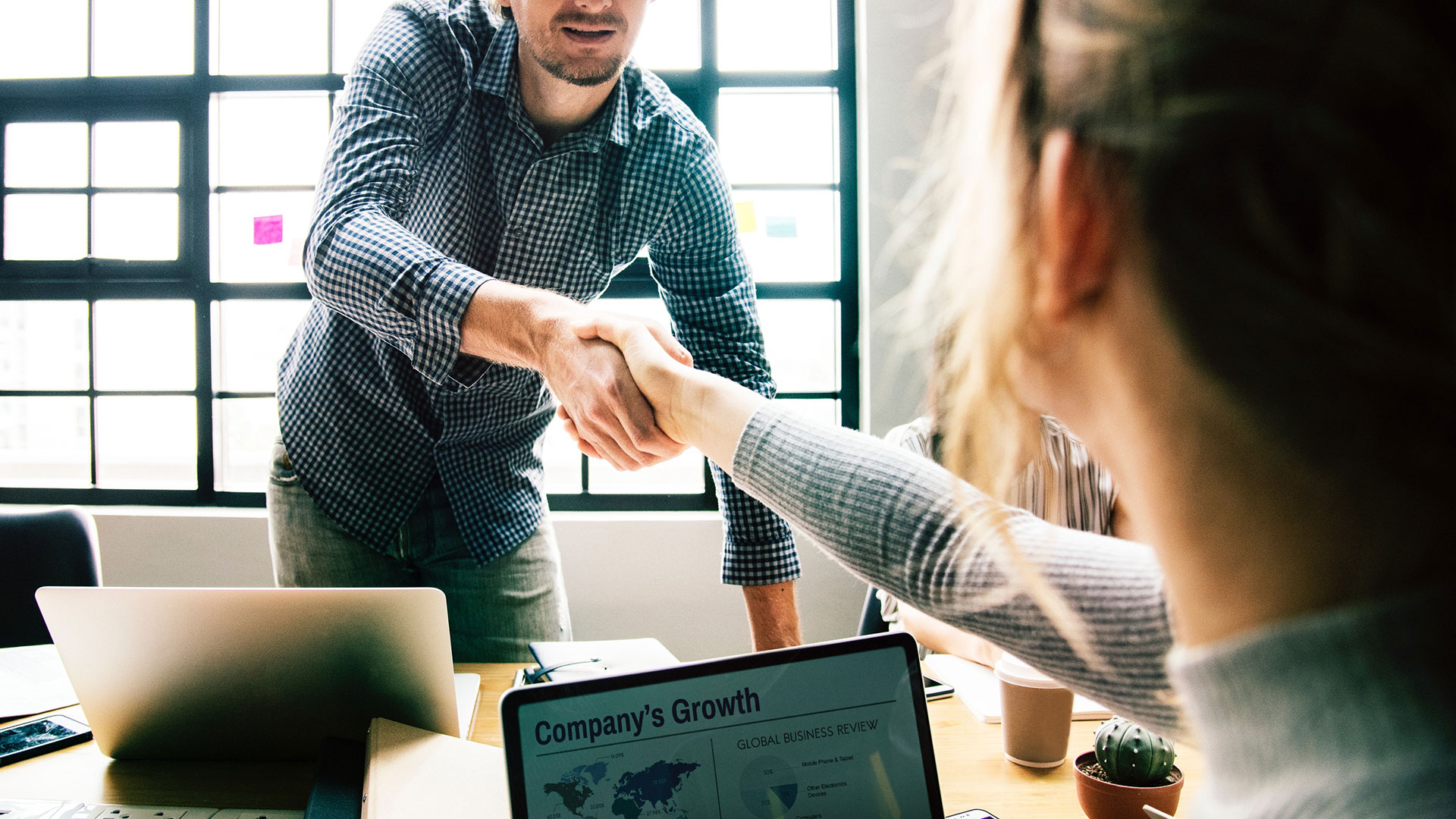 Shaking hands during meeting